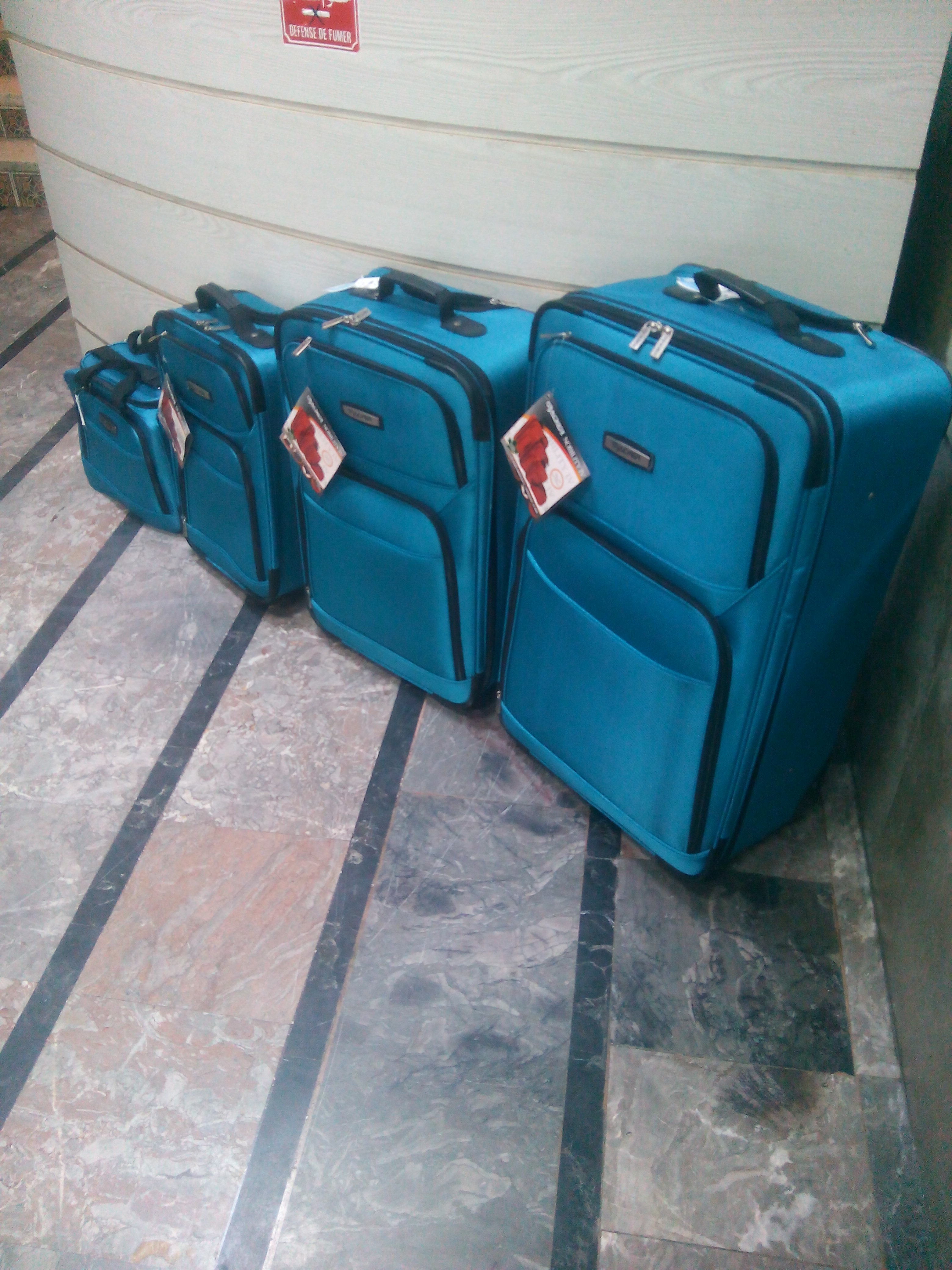 4 valise Tracker