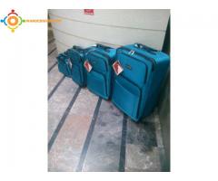 4 valise Tracker