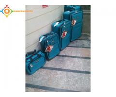 4 valise Tracker