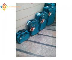 4 valise Tracker