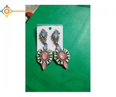 Boucles et colliers pour femme