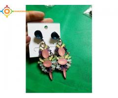 Boucles et colliers pour femme