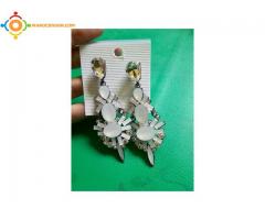 Boucles et colliers pour femme