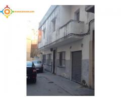 immeuble a vendre contient 6 appartements plus un garage