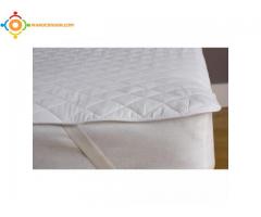 Couette et protège matelas
