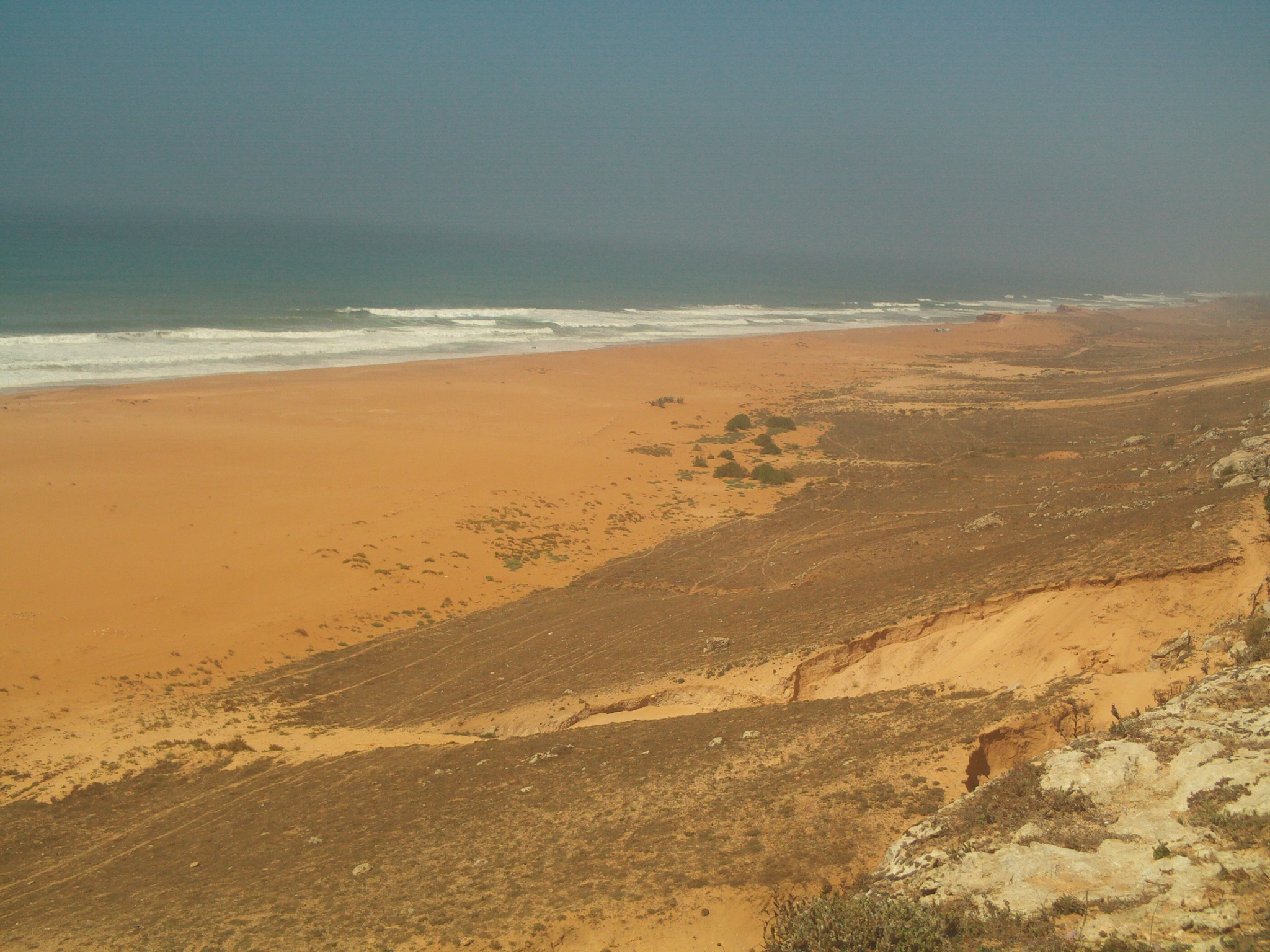 TERRAIN AU BORD DE MER